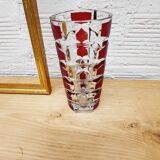 Glass vase with colored facets