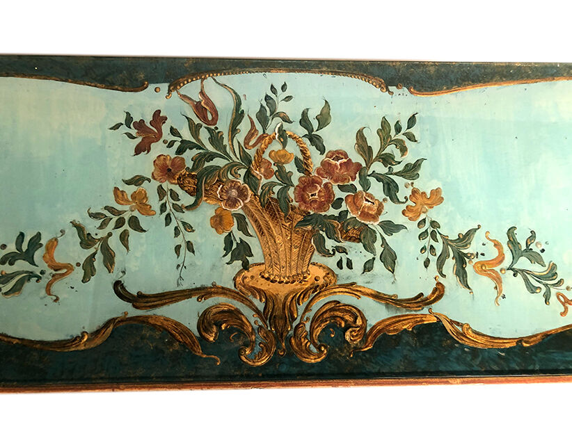 Venetian-style wooden lace-up with bouquets of flowers