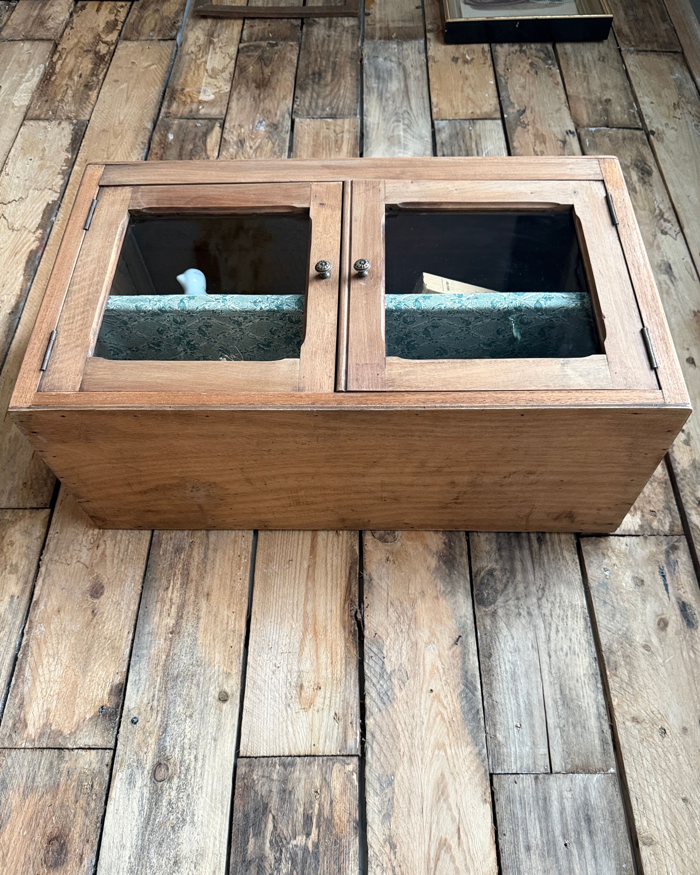 Small antique wall display cabinet in walnut.
