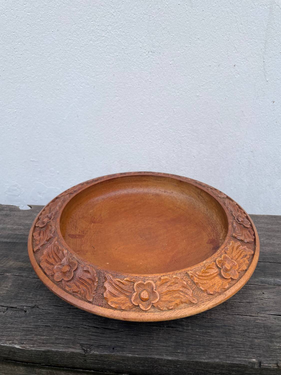 Carved wooden pocket emptier