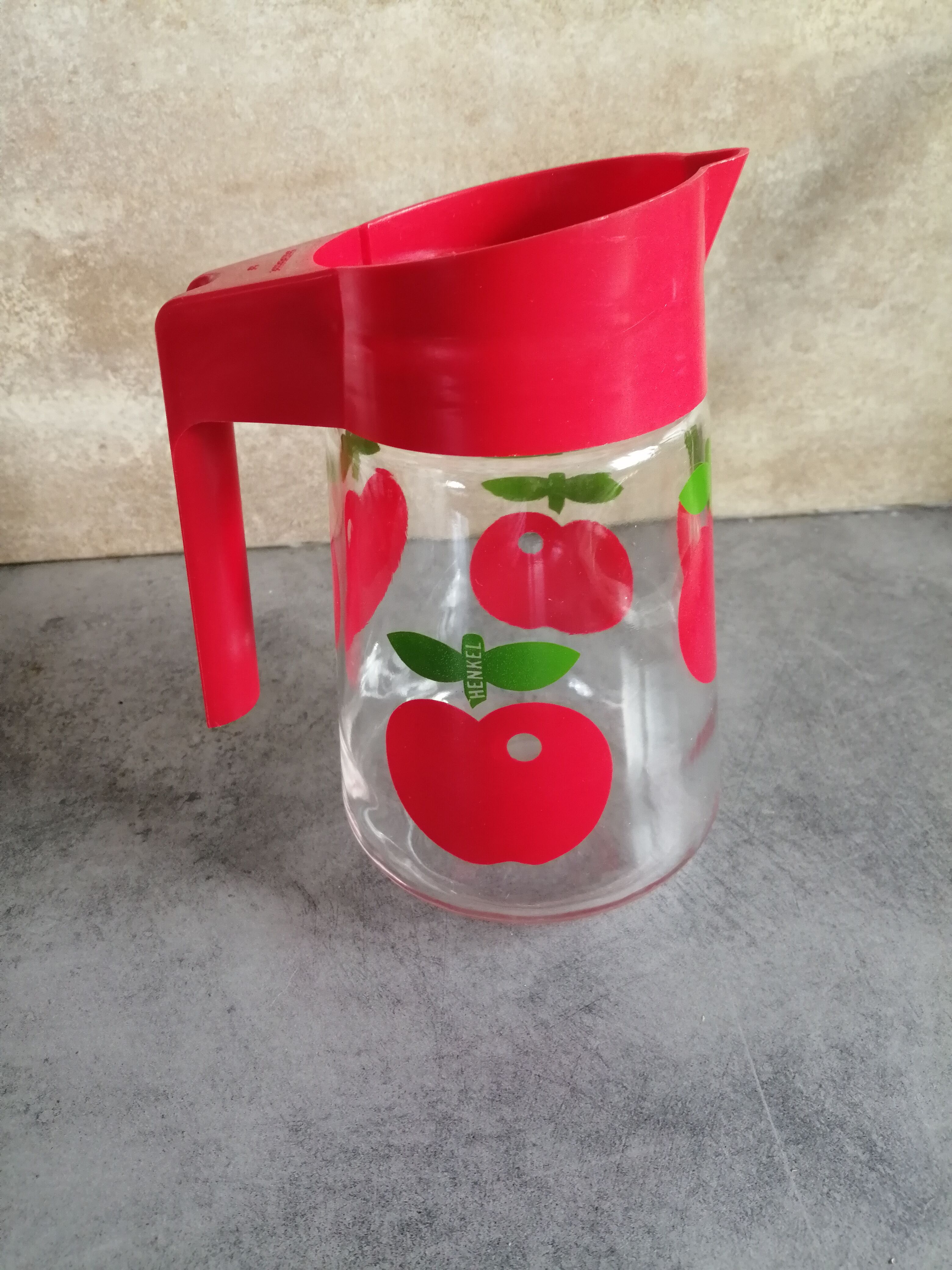 Henkel pitcher, glass with spout