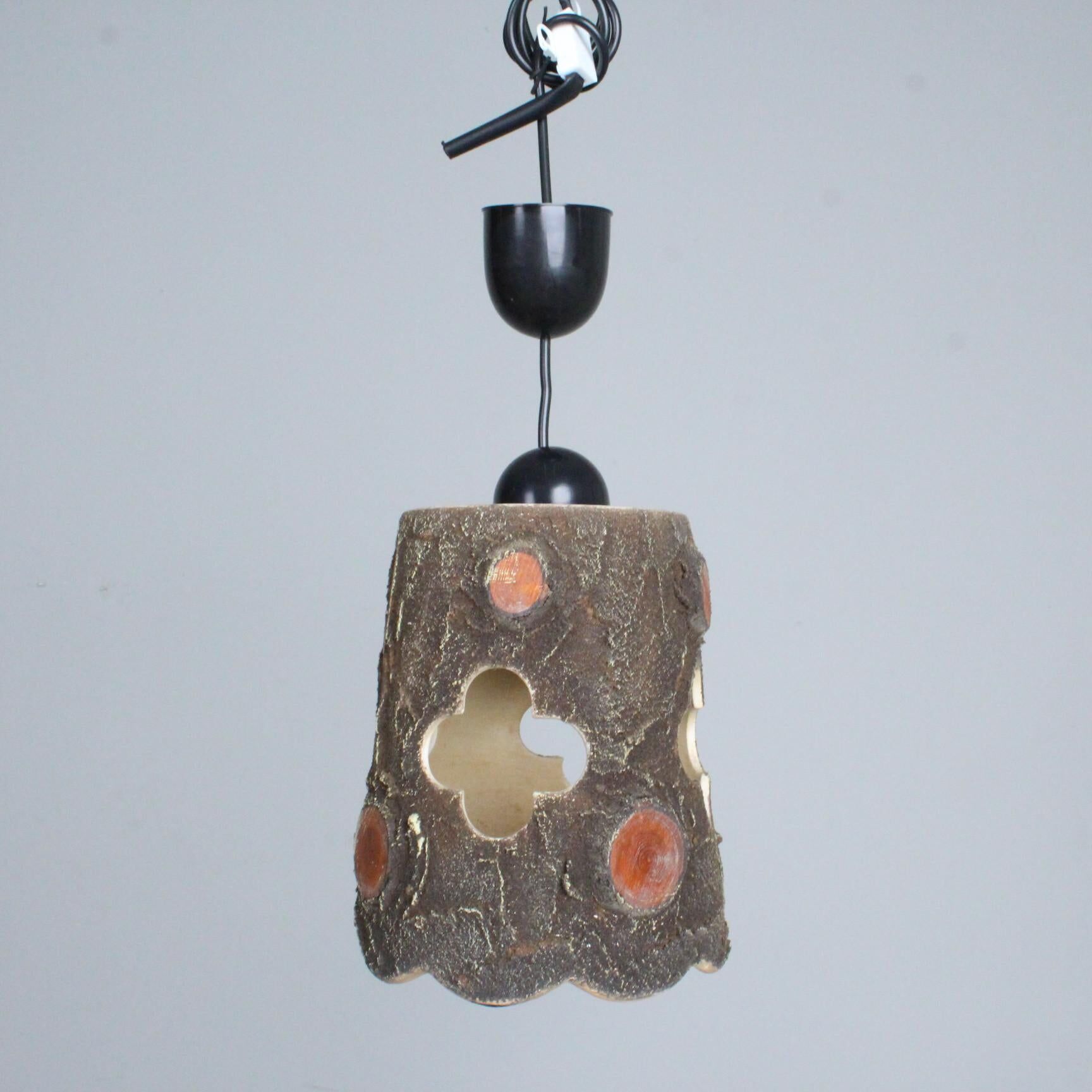 suspended lamp in brutalist ceramic France 1950