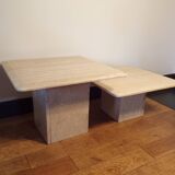 Pair of nesting travertine coffee tables