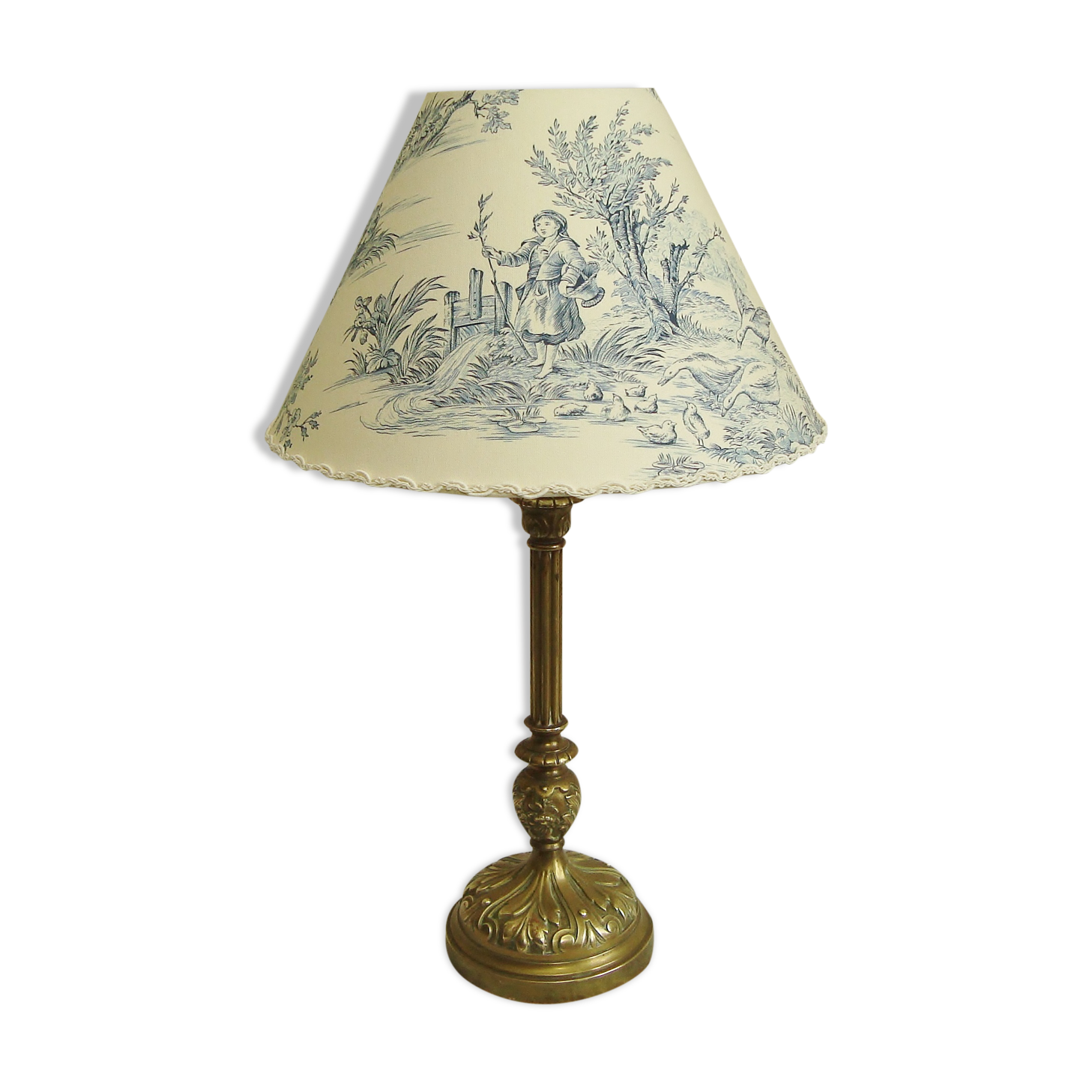 Ancient bronze lamp with its blue Jouy canvas lampshade