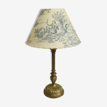 Ancient bronze lamp with its blue Jouy canvas lampshade