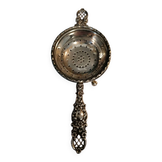 Old silver tea strainer