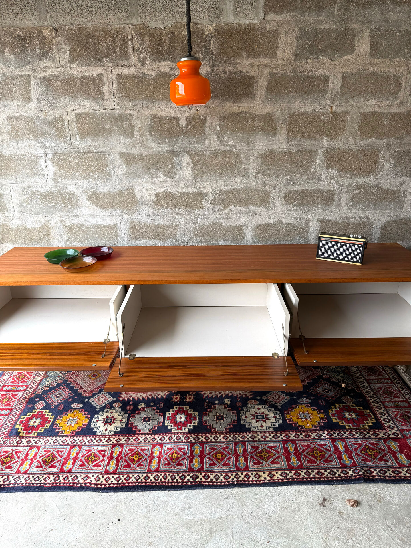 Vintage low Scandinavian sideboard in teak, 1970.