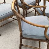 Set of 4 vintage McGuire rattan chairs with cushions.