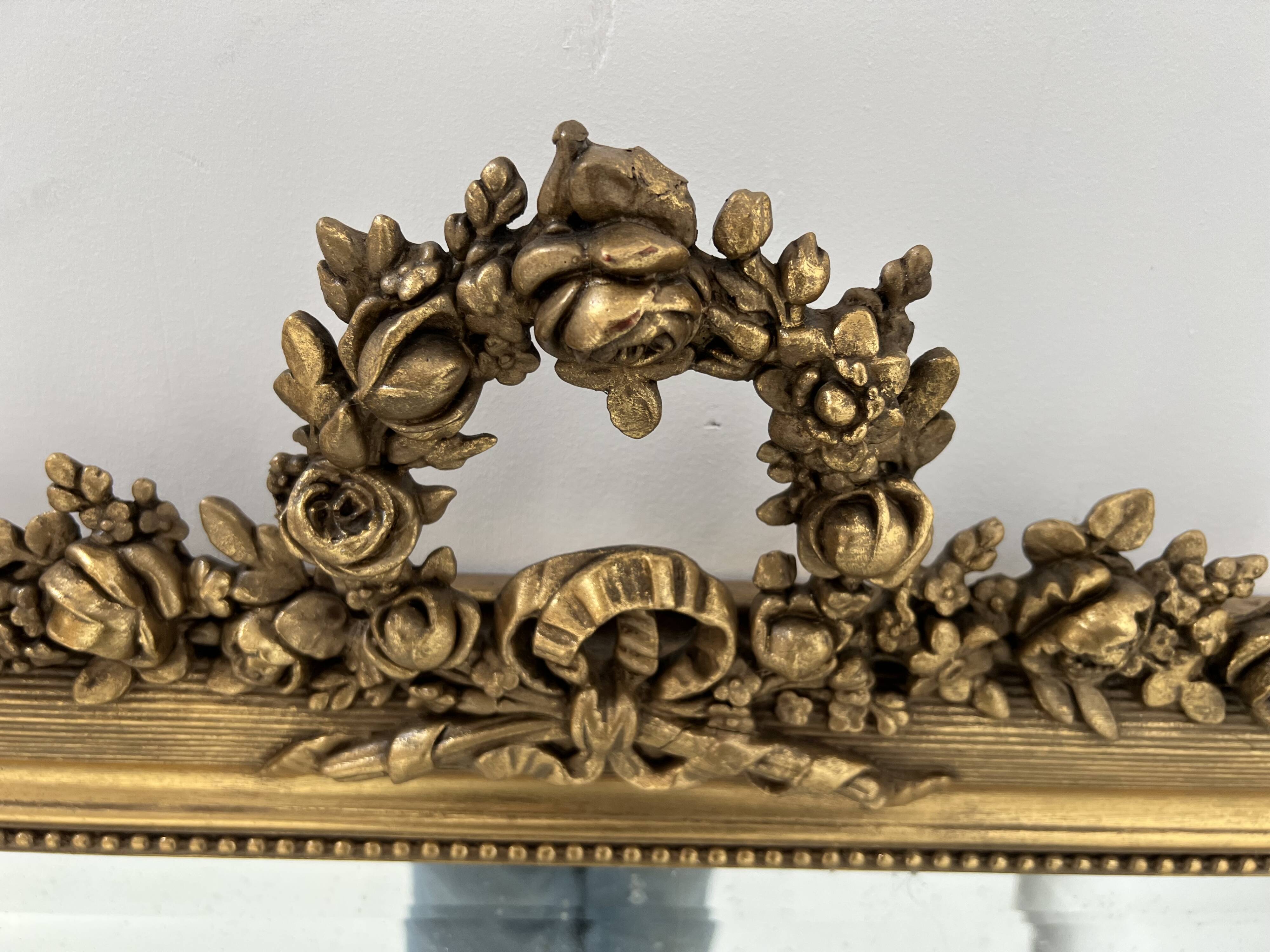 Louis XVI style mirror in wood and gilded stucco, 19th century