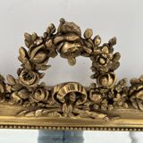 Miroir de style Louis XVI en bois et stuc doré XIX siècle