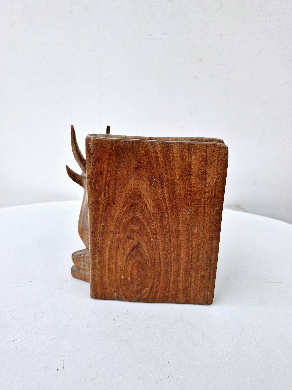 Old antelope bookend in hand carved wood