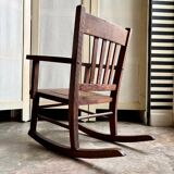 Children's rocking chair in dark wood and cane