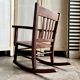 Children's rocking chair in dark wood and cane