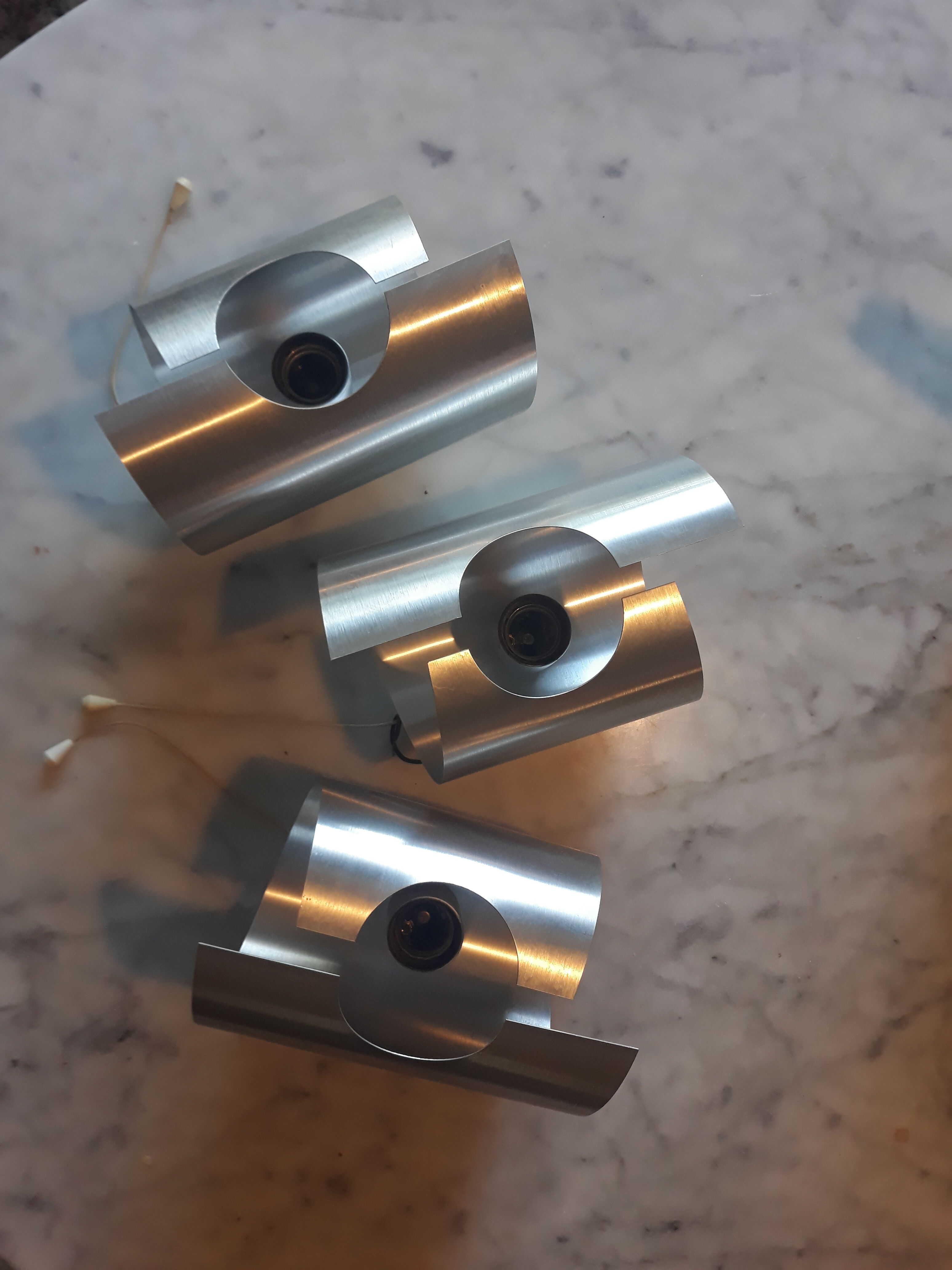 Brushed aluminum wall lamps in the 70