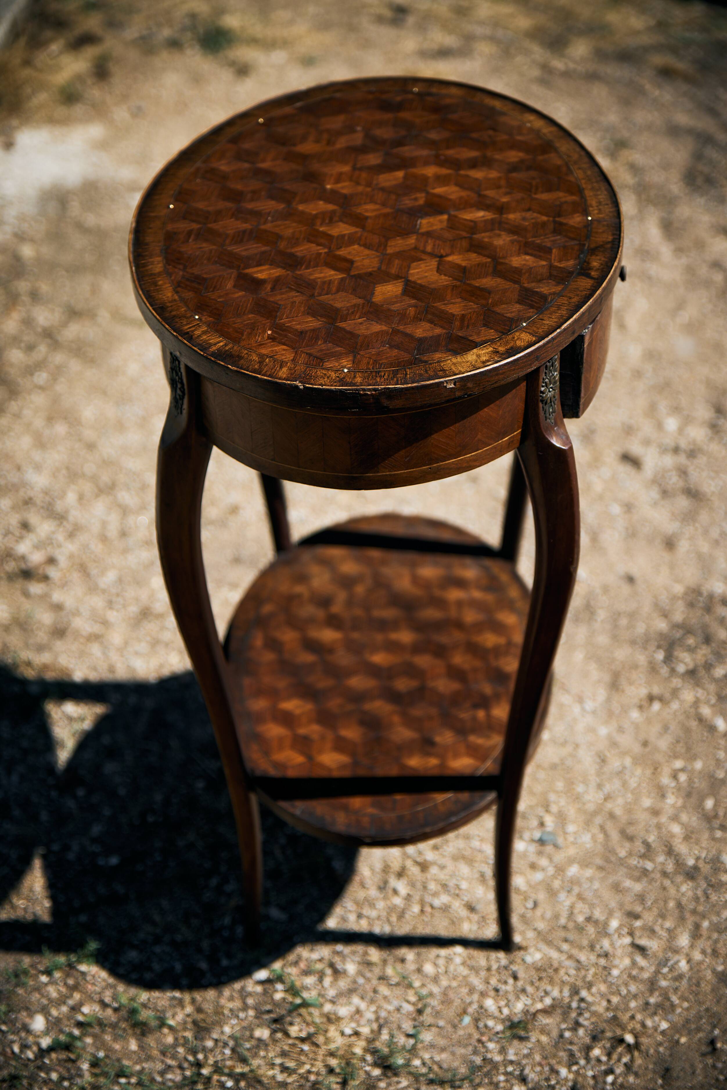 Oval coffee table in cube marquetry and bronze, Louis XV style.