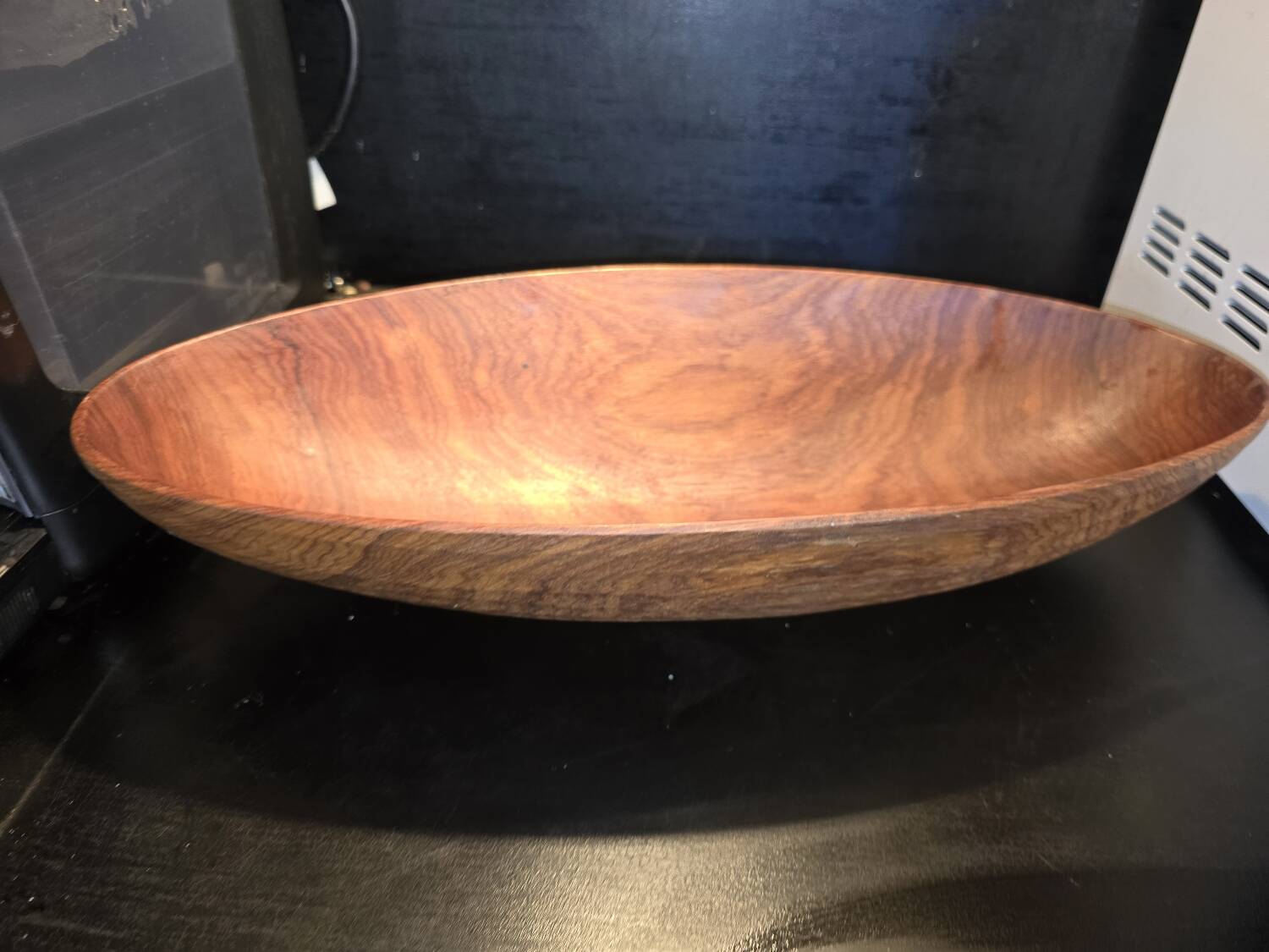 solid wood shuttle with a sleek and organic design.