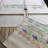 Set of 12 embroidered linen table sets