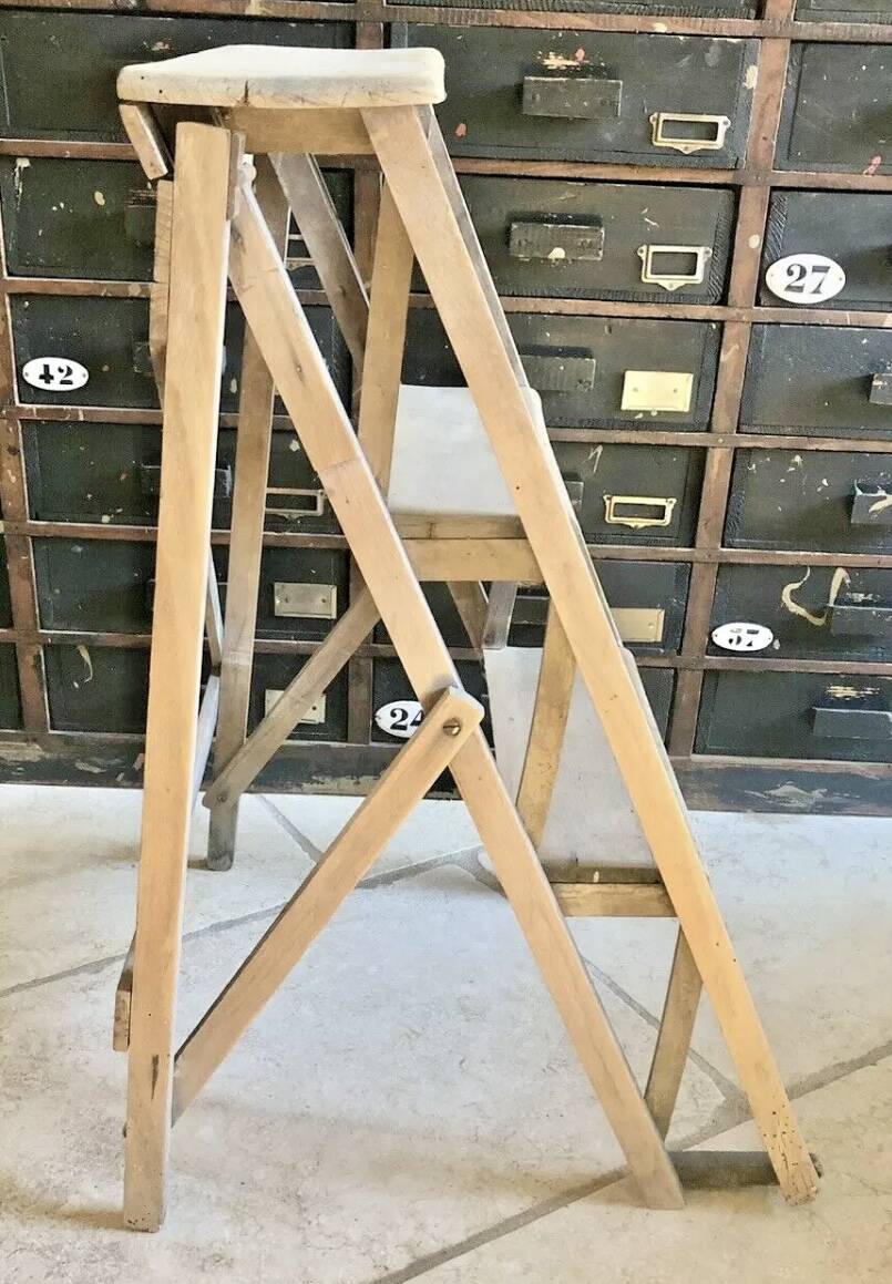 Old small painter's stepladder, wooden trade furniture, step stool