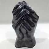 Vase with intertwined hands