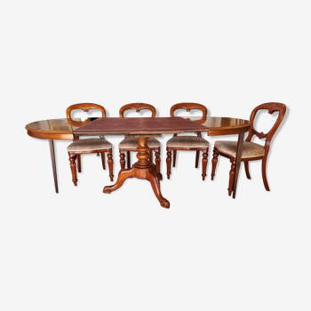 Table ronde et 4 chaises acajou des indes