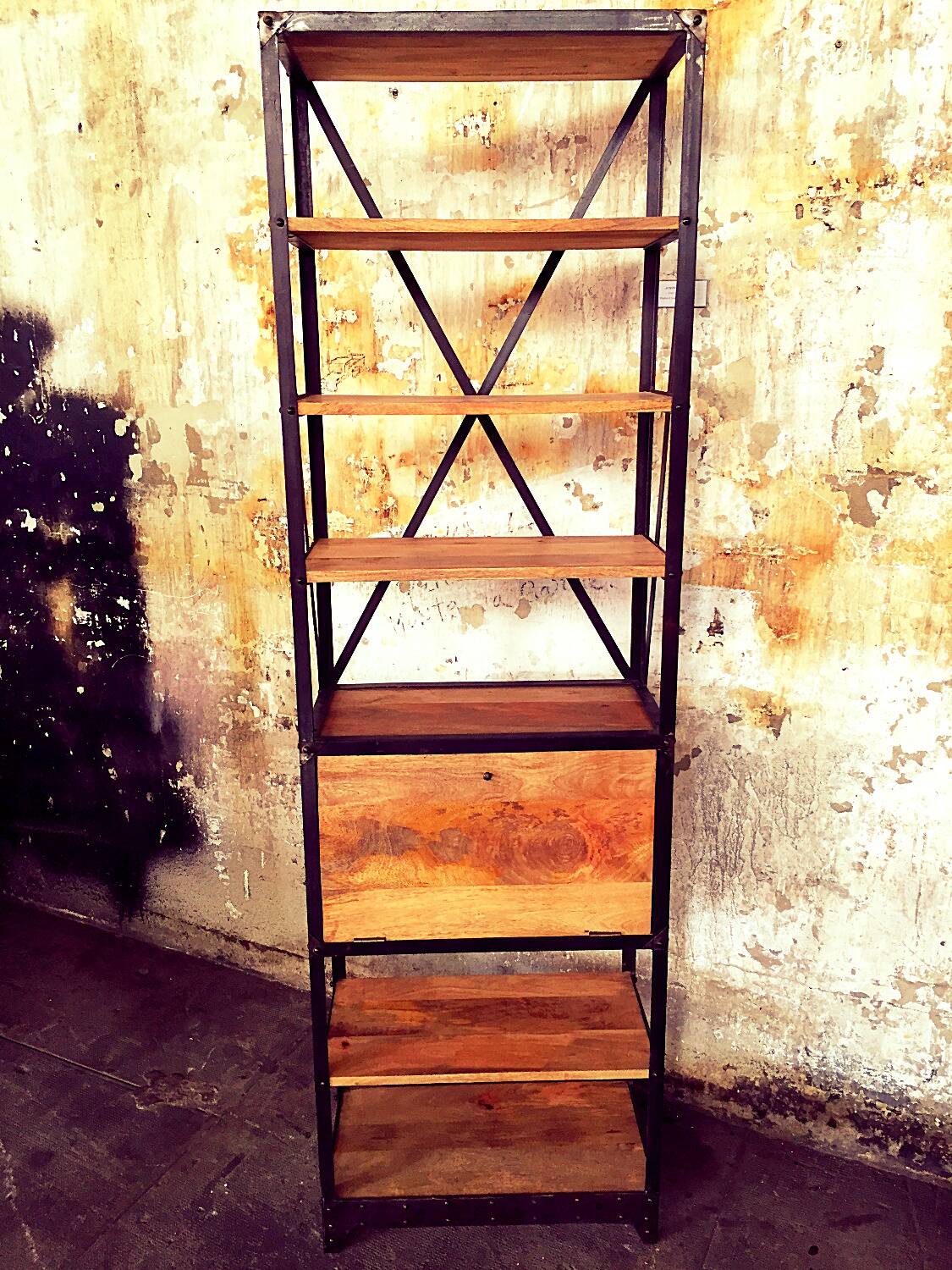 Industrial shelf made of solid exotic mango wood with riveted metal.