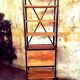 Industrial shelf made of solid exotic mango wood with riveted metal.