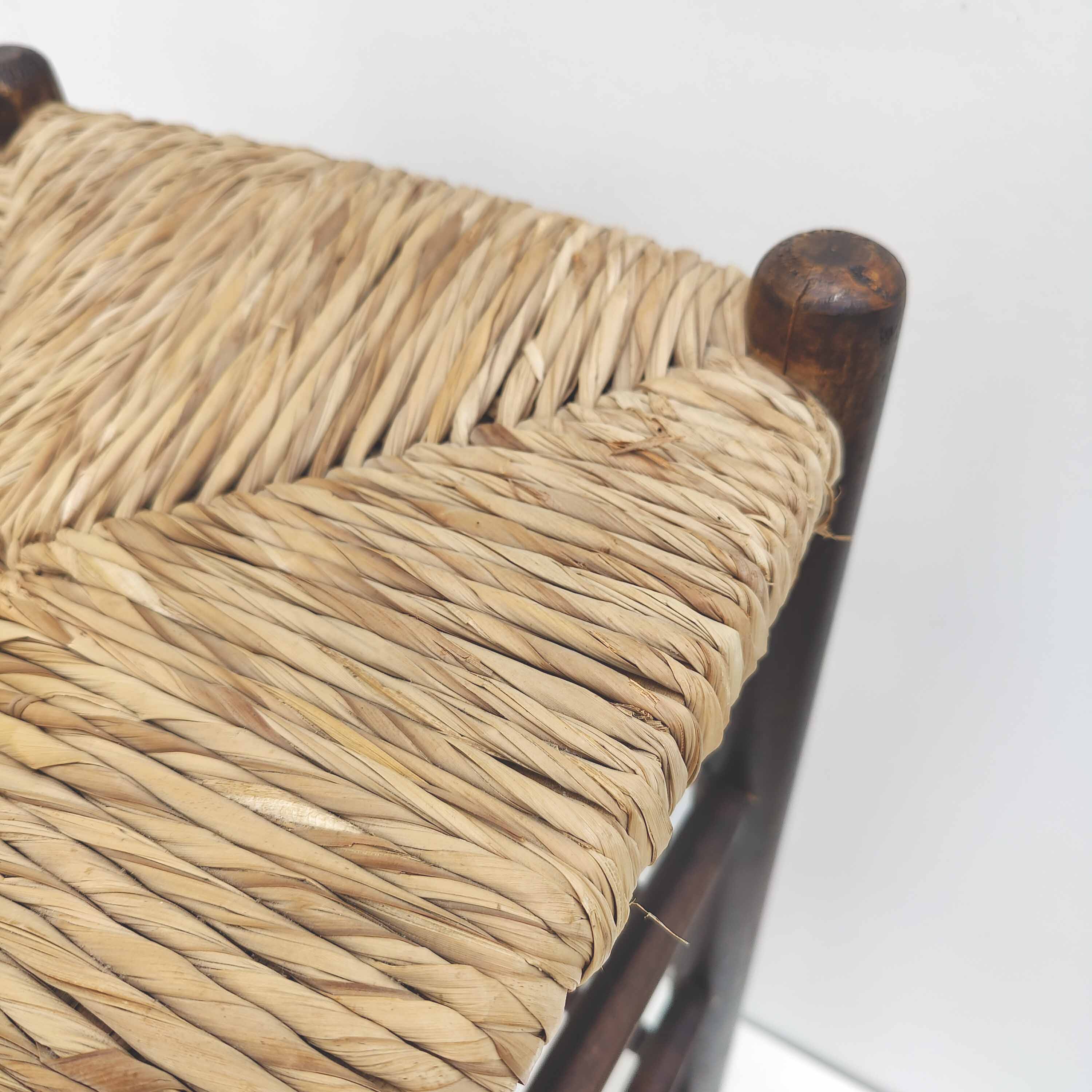 Blackened wooden bar top stool with mulched seat