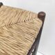 Blackened wooden bar top stool with mulched seat