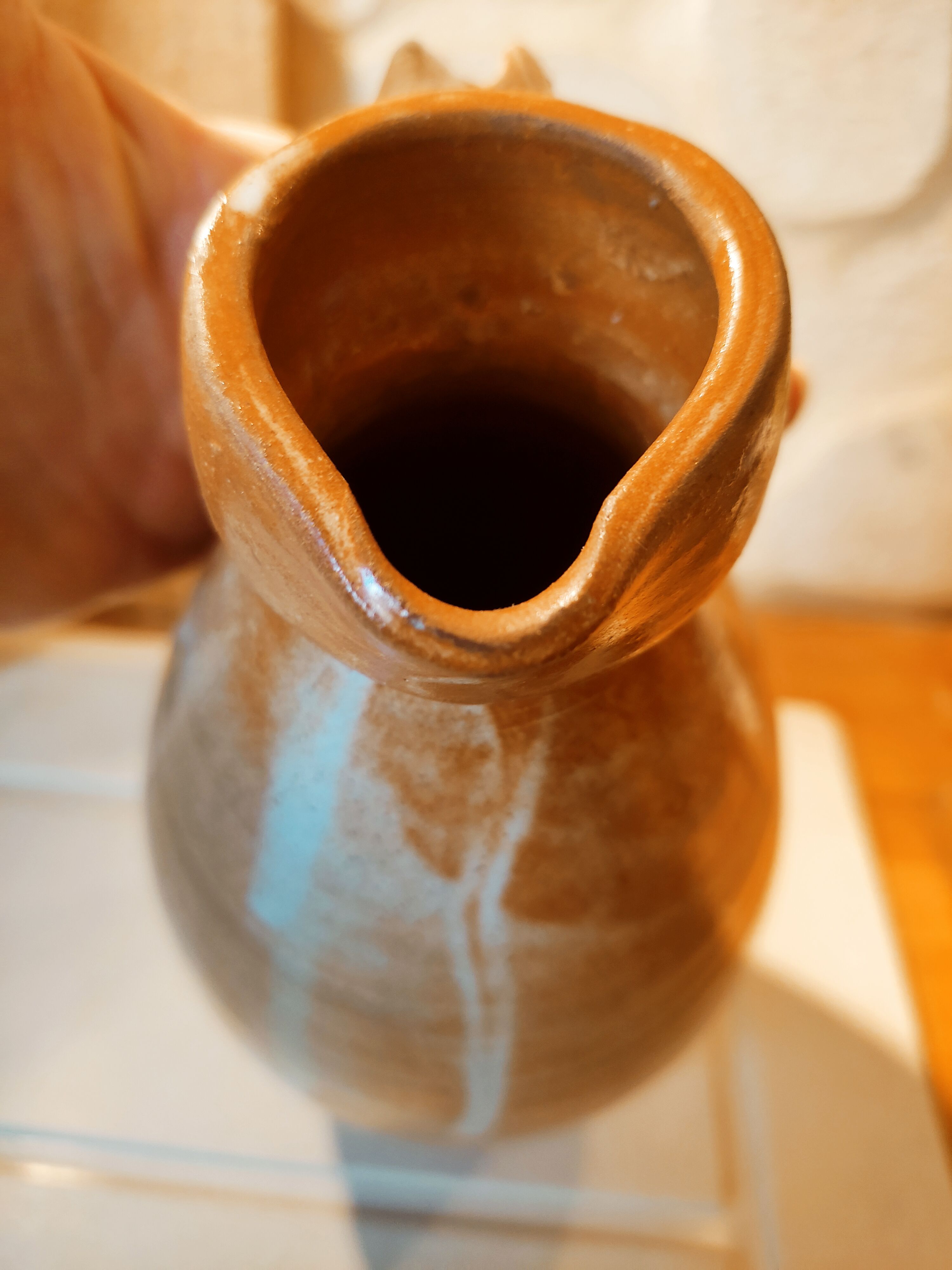 Duo of pitchers water, wine