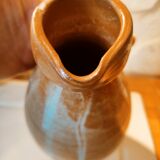 Duo of pitchers water, wine