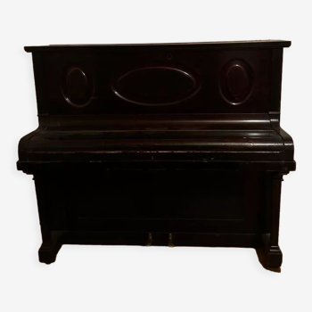 Black upright piano