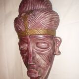 African mask in earth