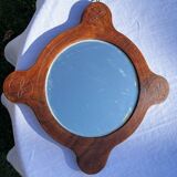 Wooden mirror with vintage rosettes