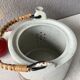 Théière japonaise vintage en porcelaine