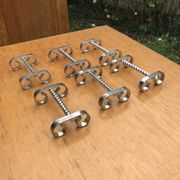 6 vintage silver metal knife holders from the 1960s