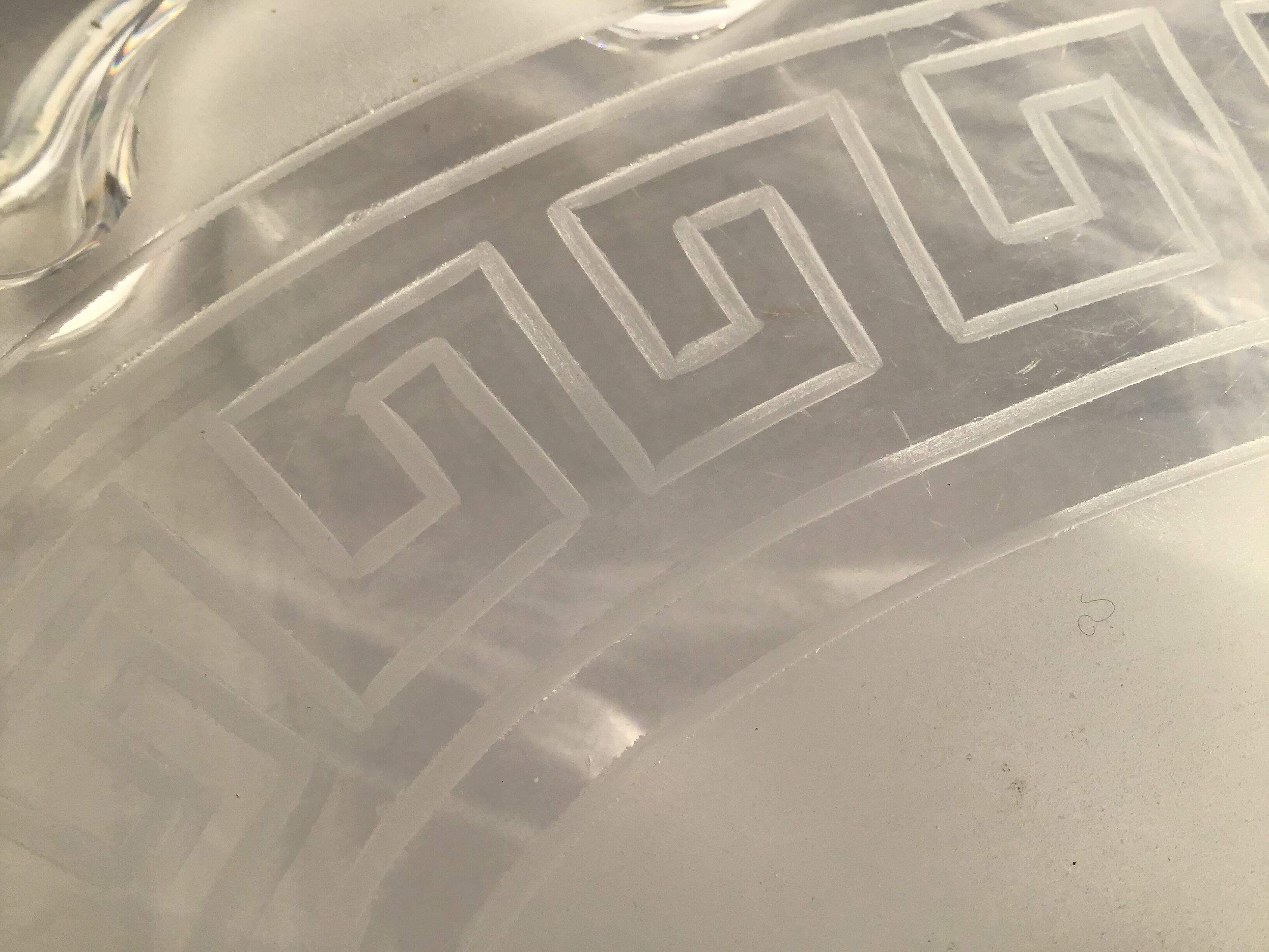 Flat engraved glass festooned ovale