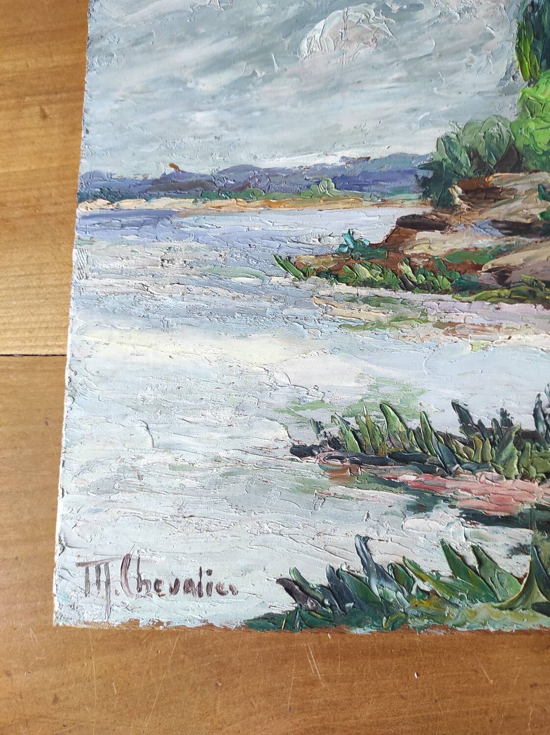 Riverside landscape painting (signed Chevalier)