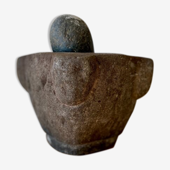 Mortar and pestle in black stone