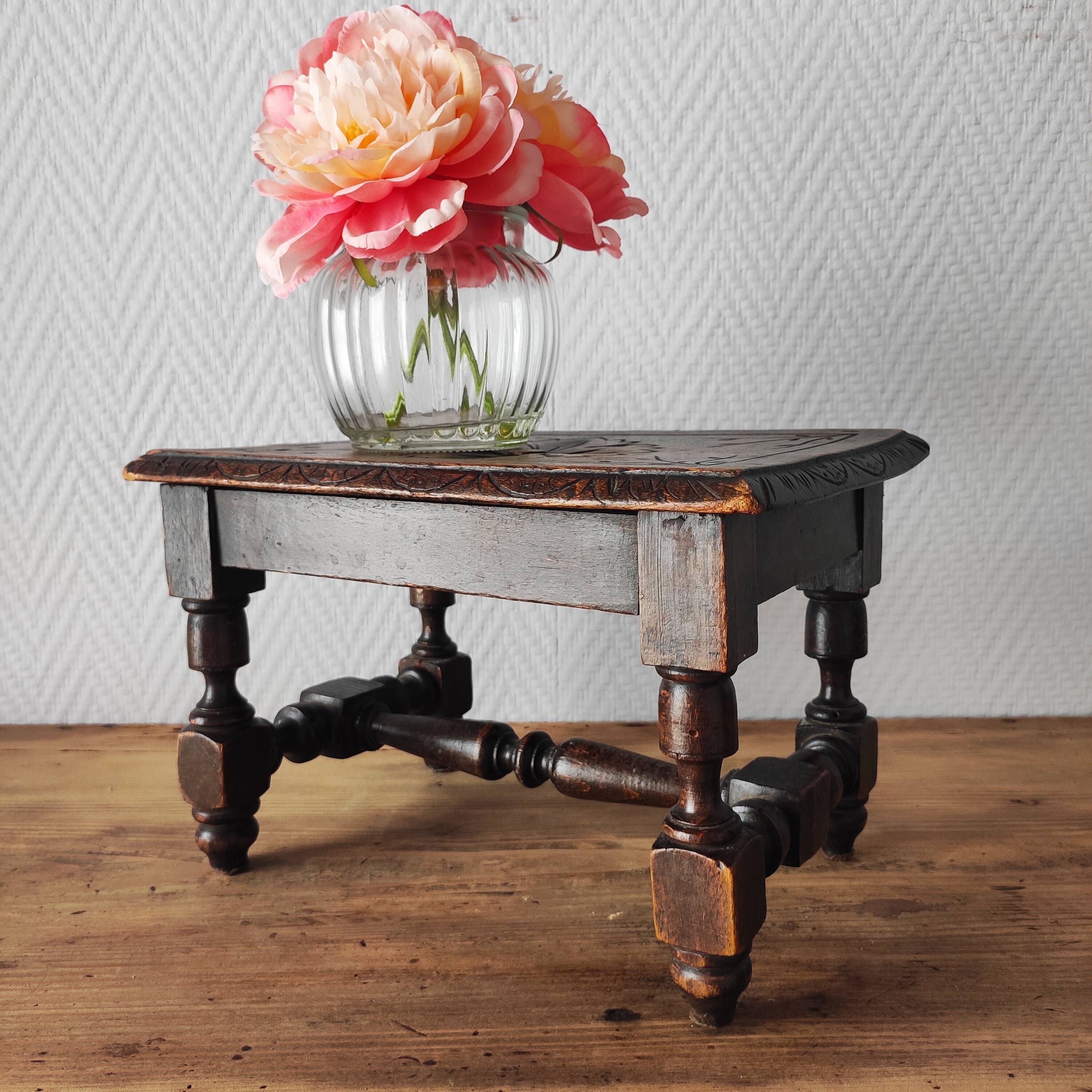 Old carved wooden footrest