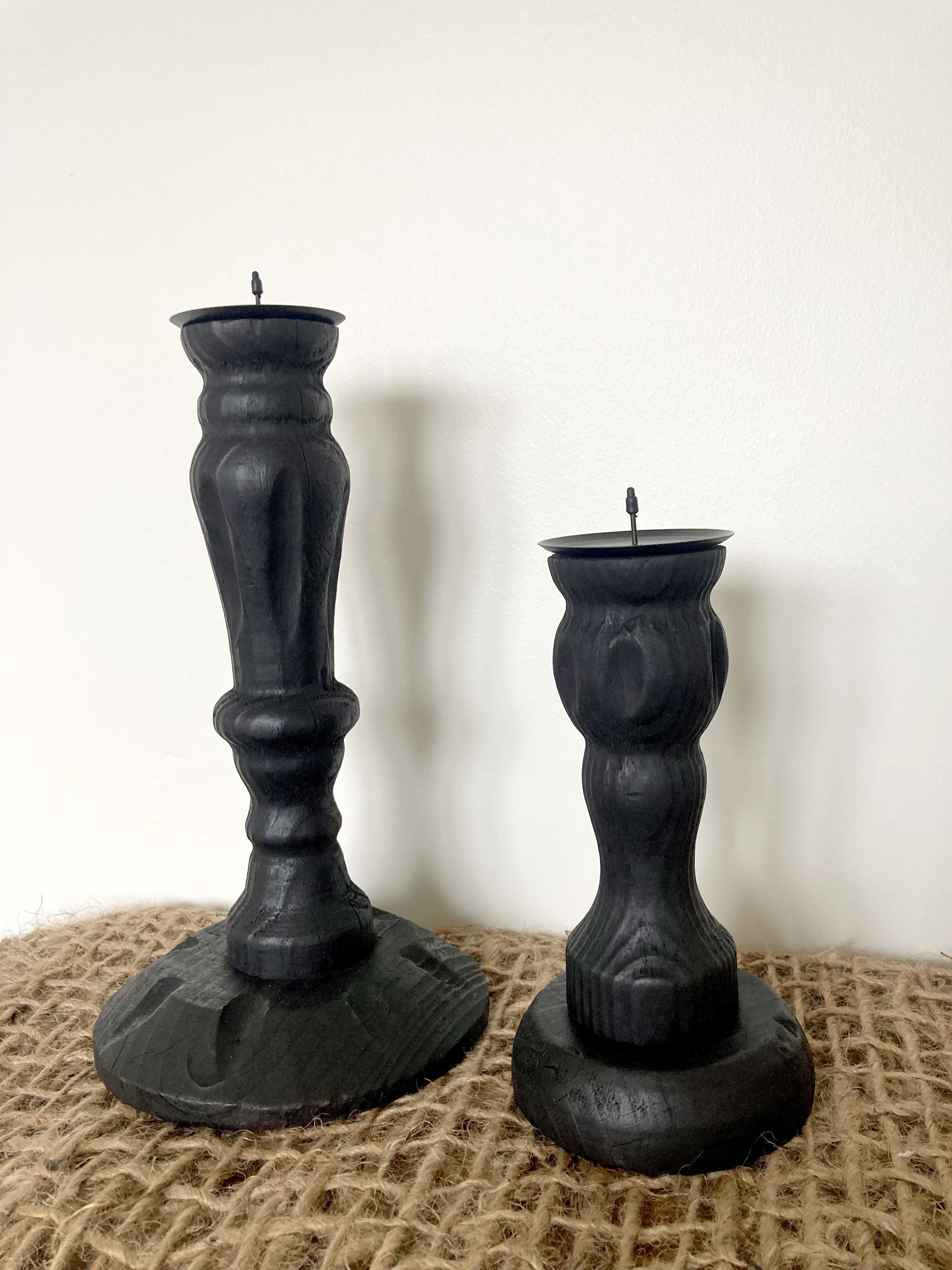 Black wooden candlesticks