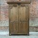 Armoire antique française à motifs floraux sculptés à la main