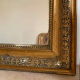 Miroir Louis Philippe patine doré et ornements