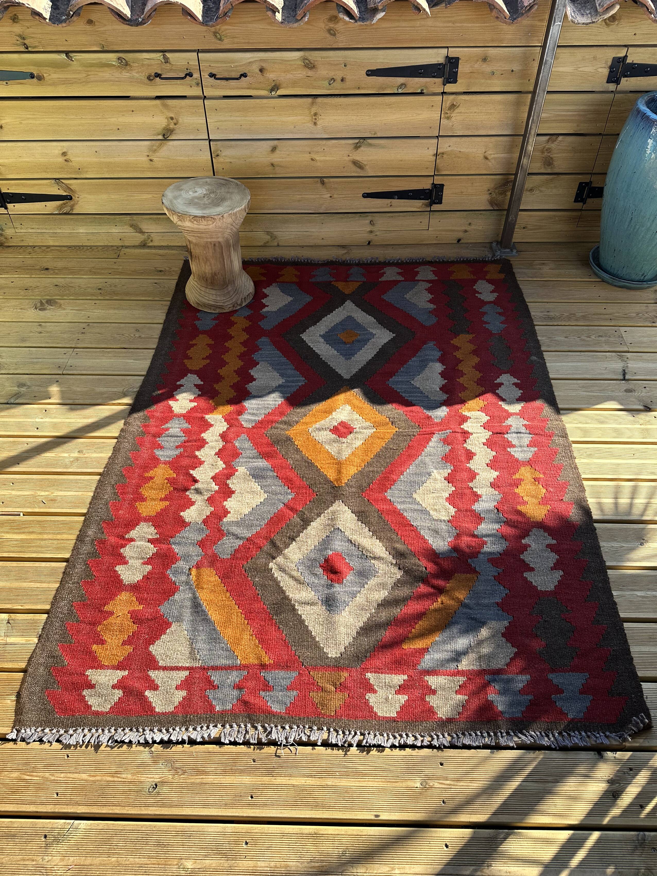 Multicoloured handmade wool kilim rug. Turkey, 1970s.