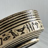 Ancient bowl decorated with hieroglyphs.
