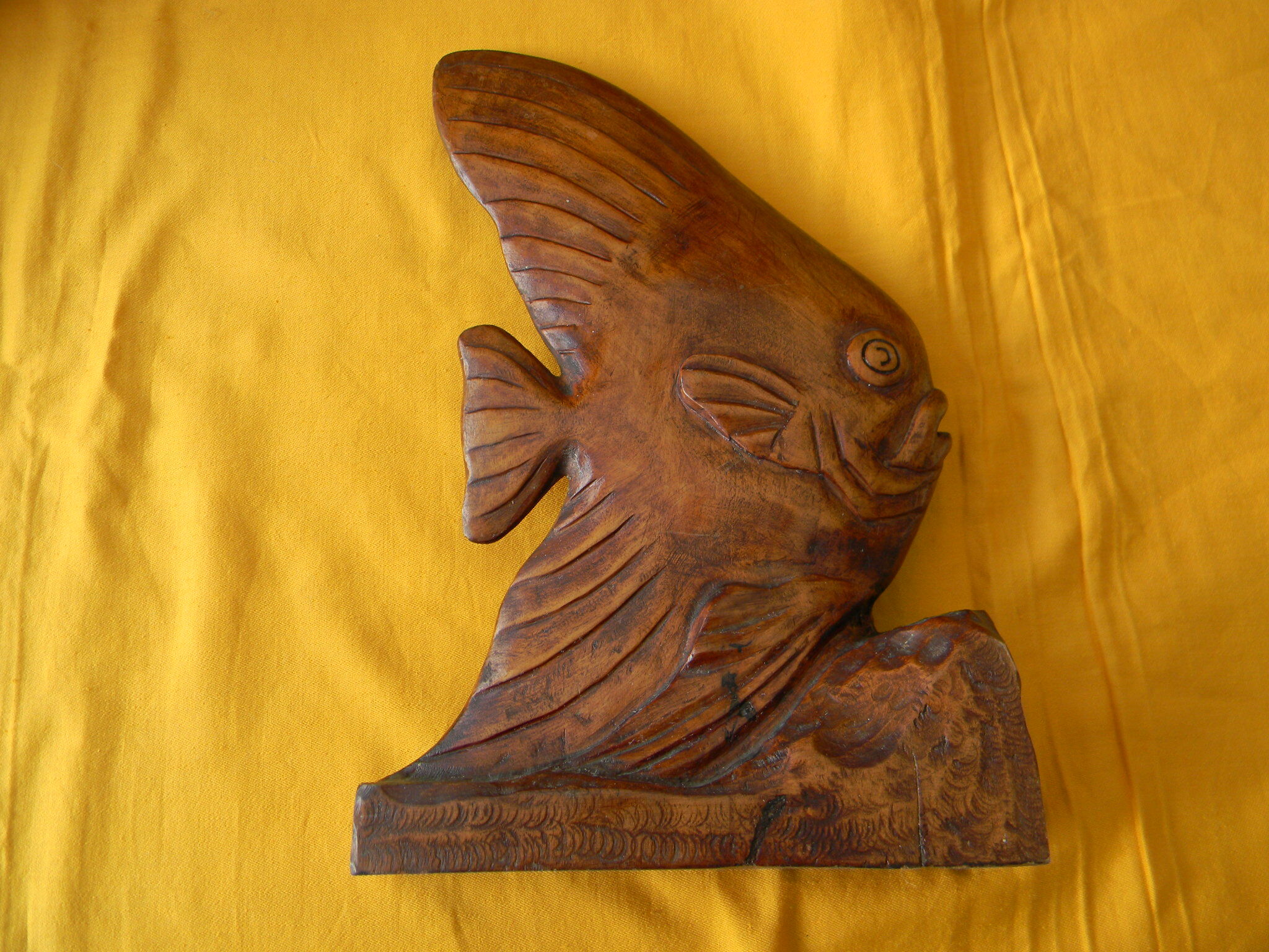 Wooden sculpture representing a langeac fish