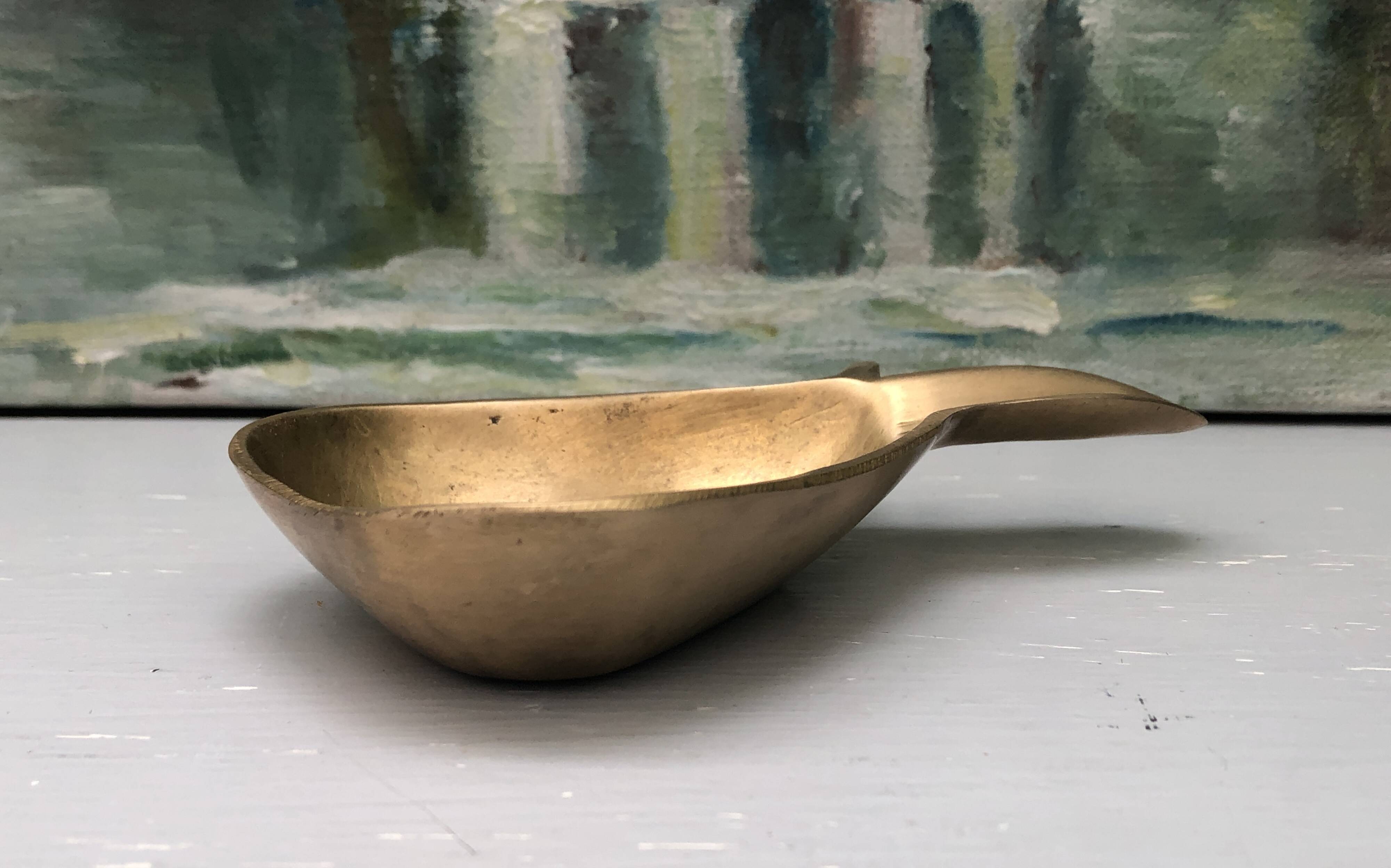 Vintage brass ashtray in the shape of a fruit, pear