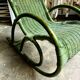 Children's rocking chair in woven wicker and green rattan
