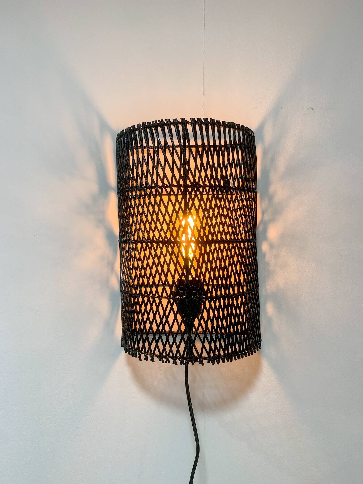 Black rattan wall light