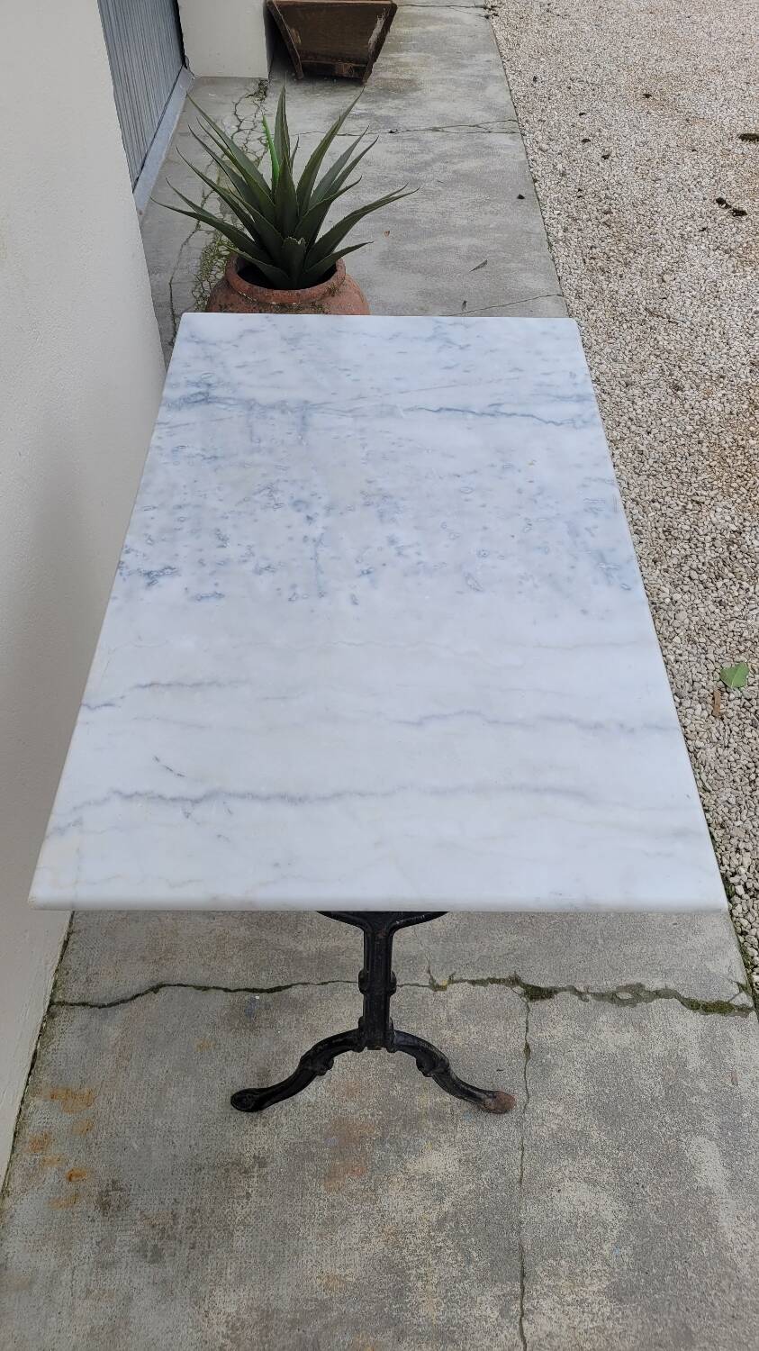 Marble and antique cast iron bistro table