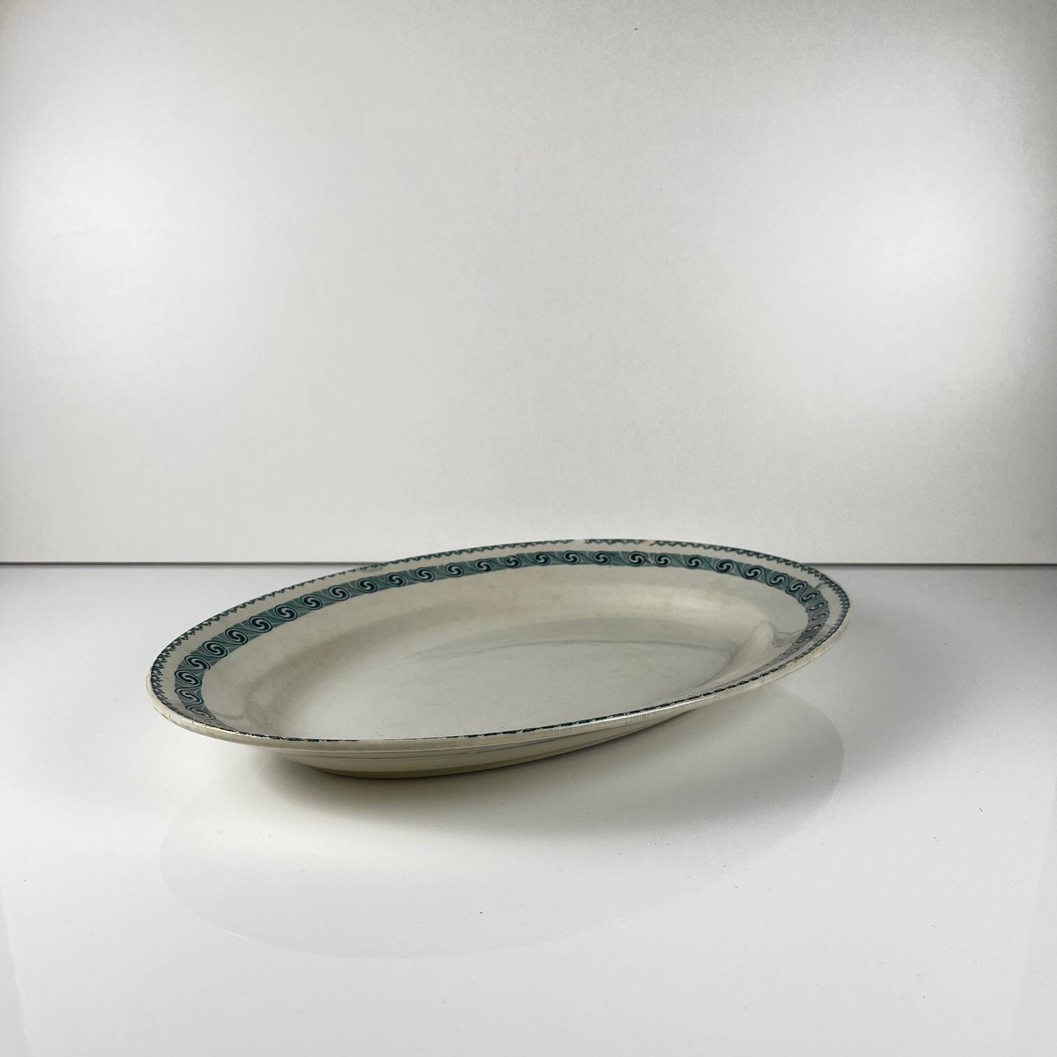 Large oval dish "Rachel" Moulins des loups & Hamage, iron earth, 20th century